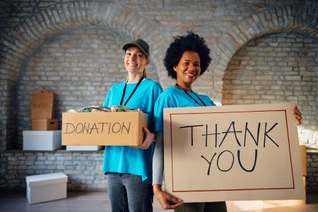 happy-women-volunteering-at-charitable-foundation-2024-02-09-19-34-53-utc